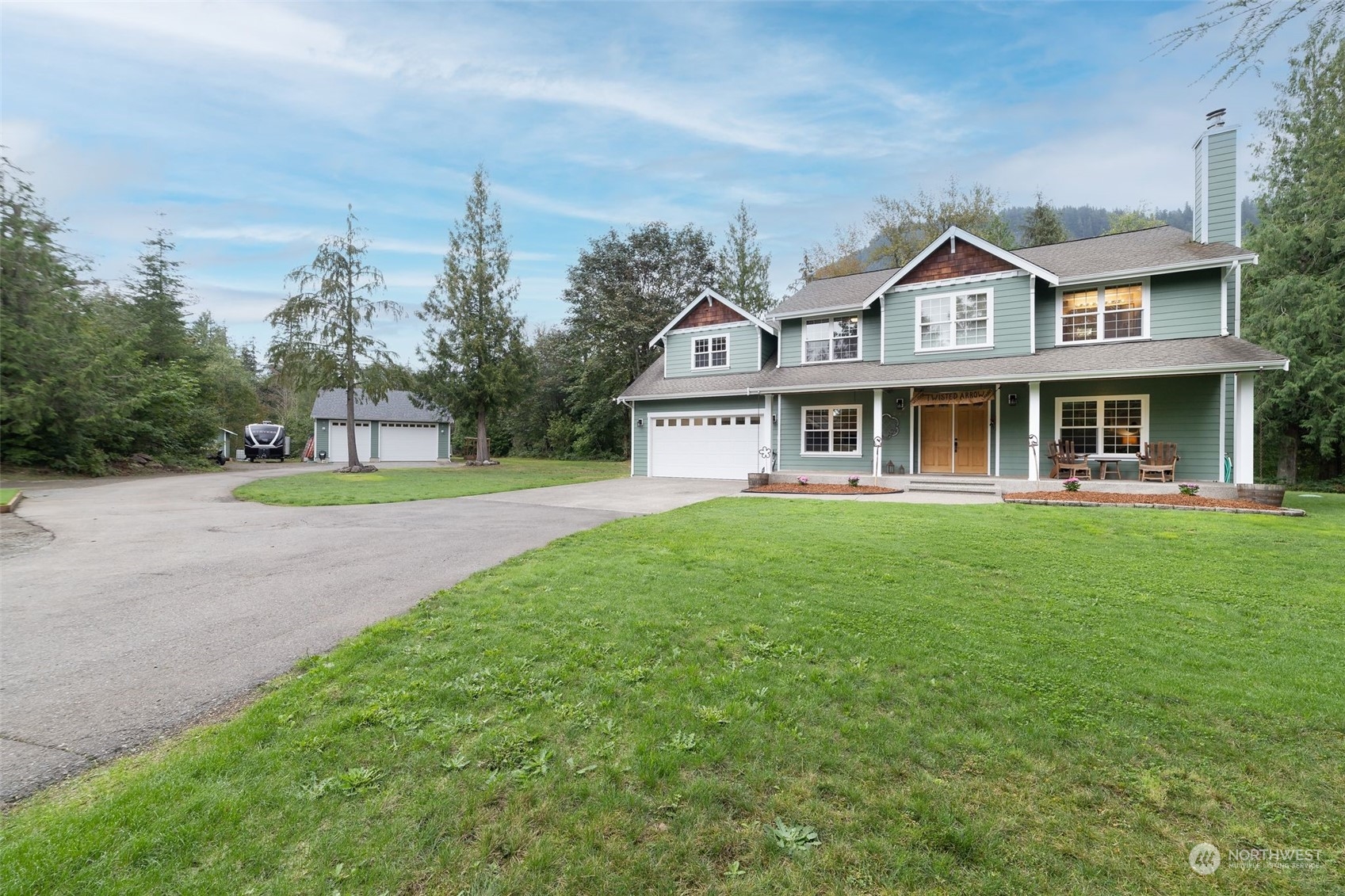 a front view of a house with a yard