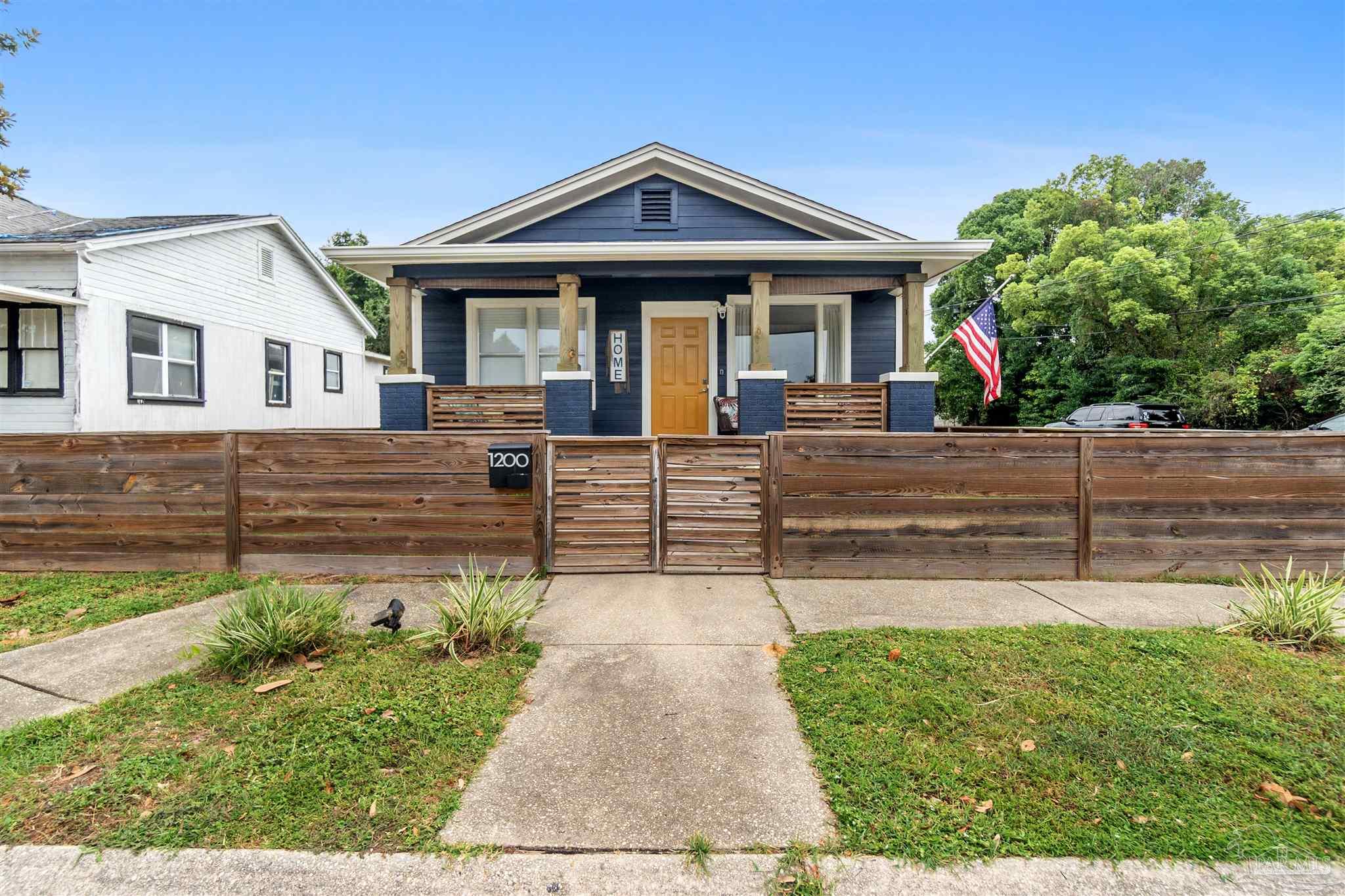 a front view of a house with a porch