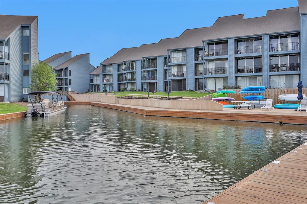 a view of a lake with a building next to a lake