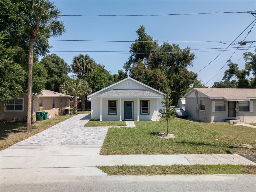 front view of a house with a yard