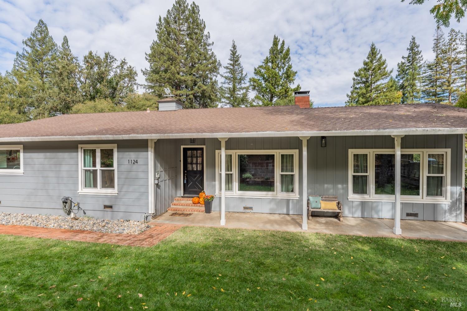 front view of a house with a patio