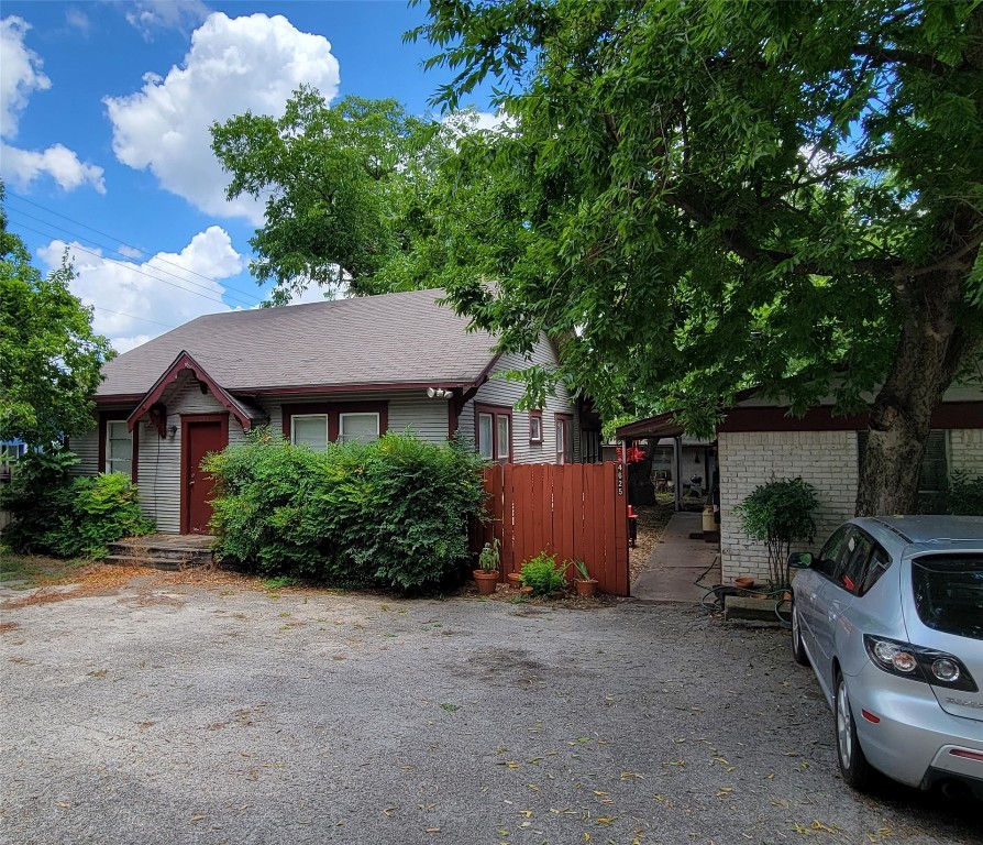 a view of a house with garden