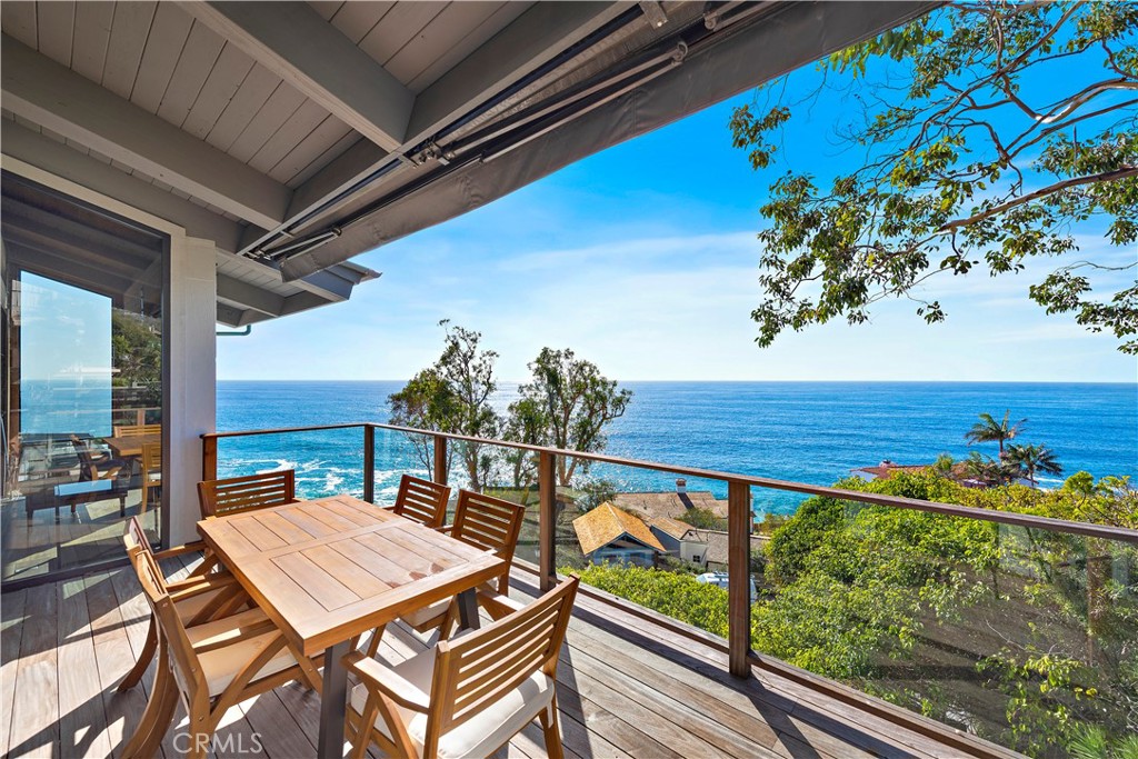 a view of a balcony with chairs