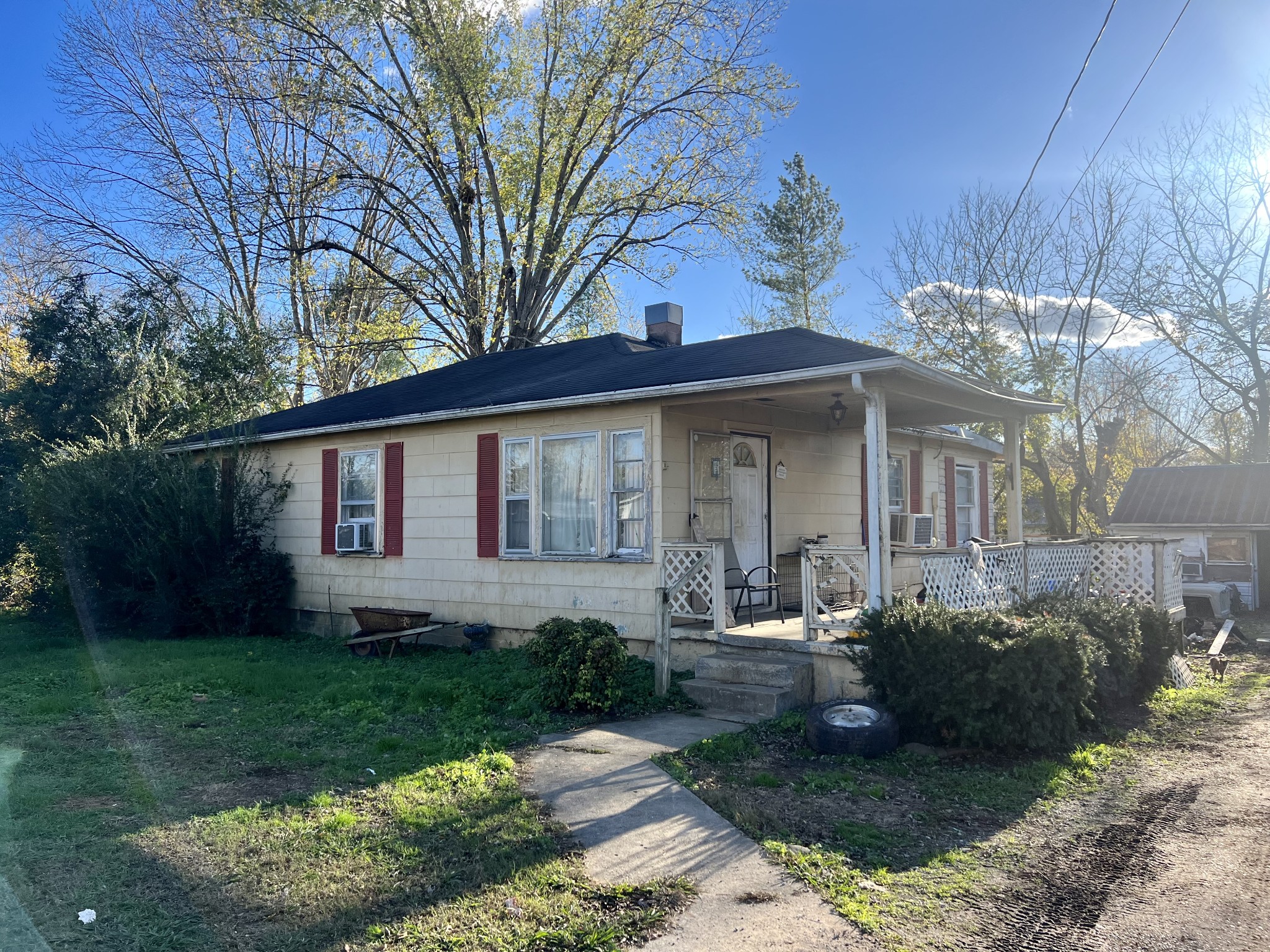 a front view of a house with a yard outdoor seating and yard