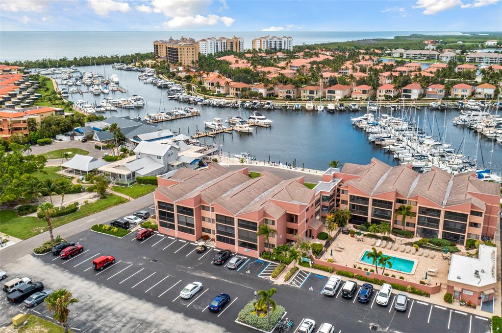 an aerial view of a house with a lake view