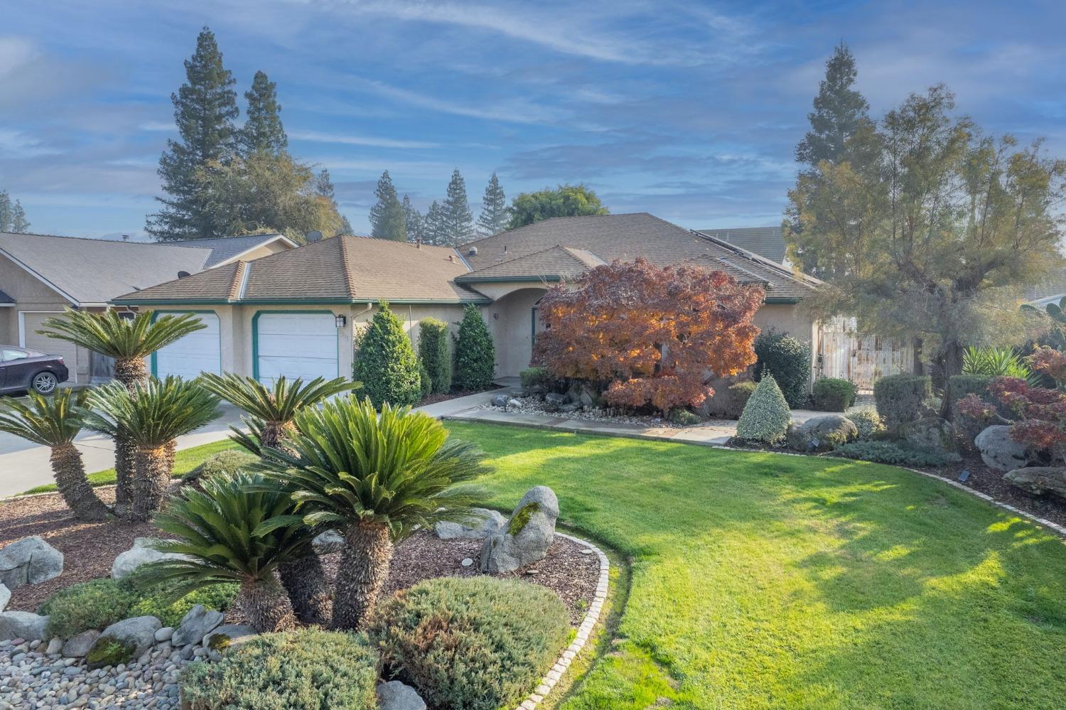 a view of a house with a garden