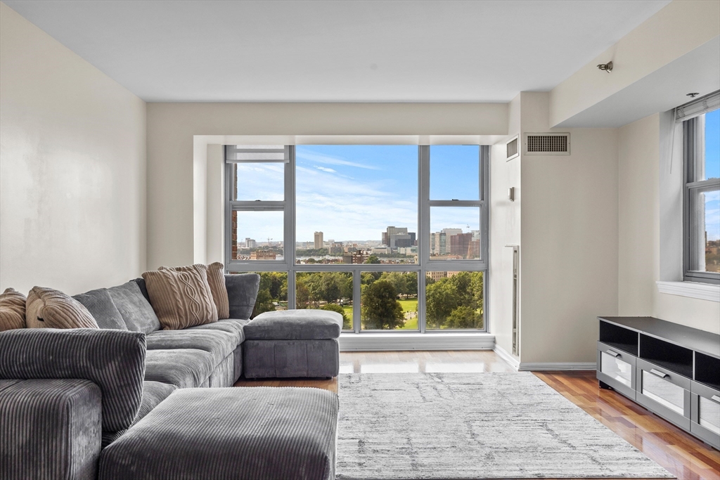 a living room with furniture and a window