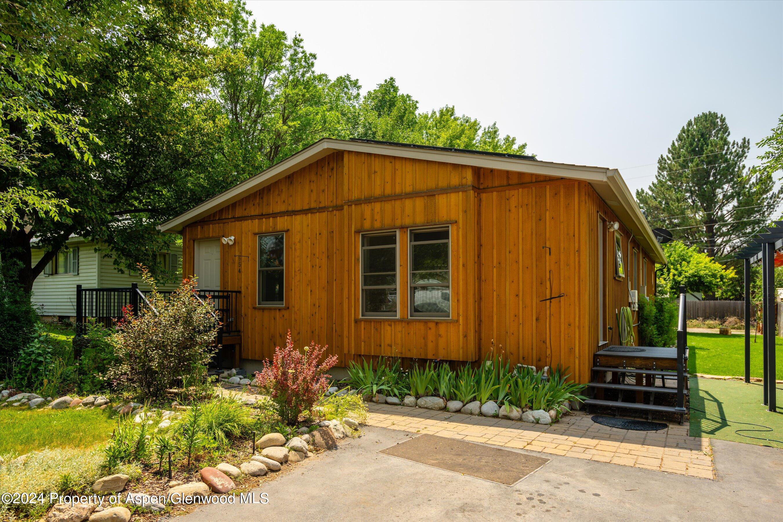 a front view of a house having yard