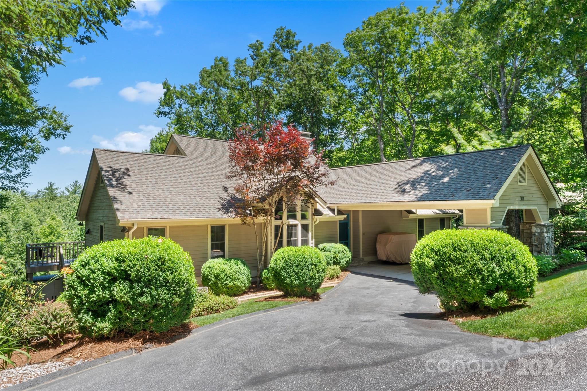 front view of a house with a yard