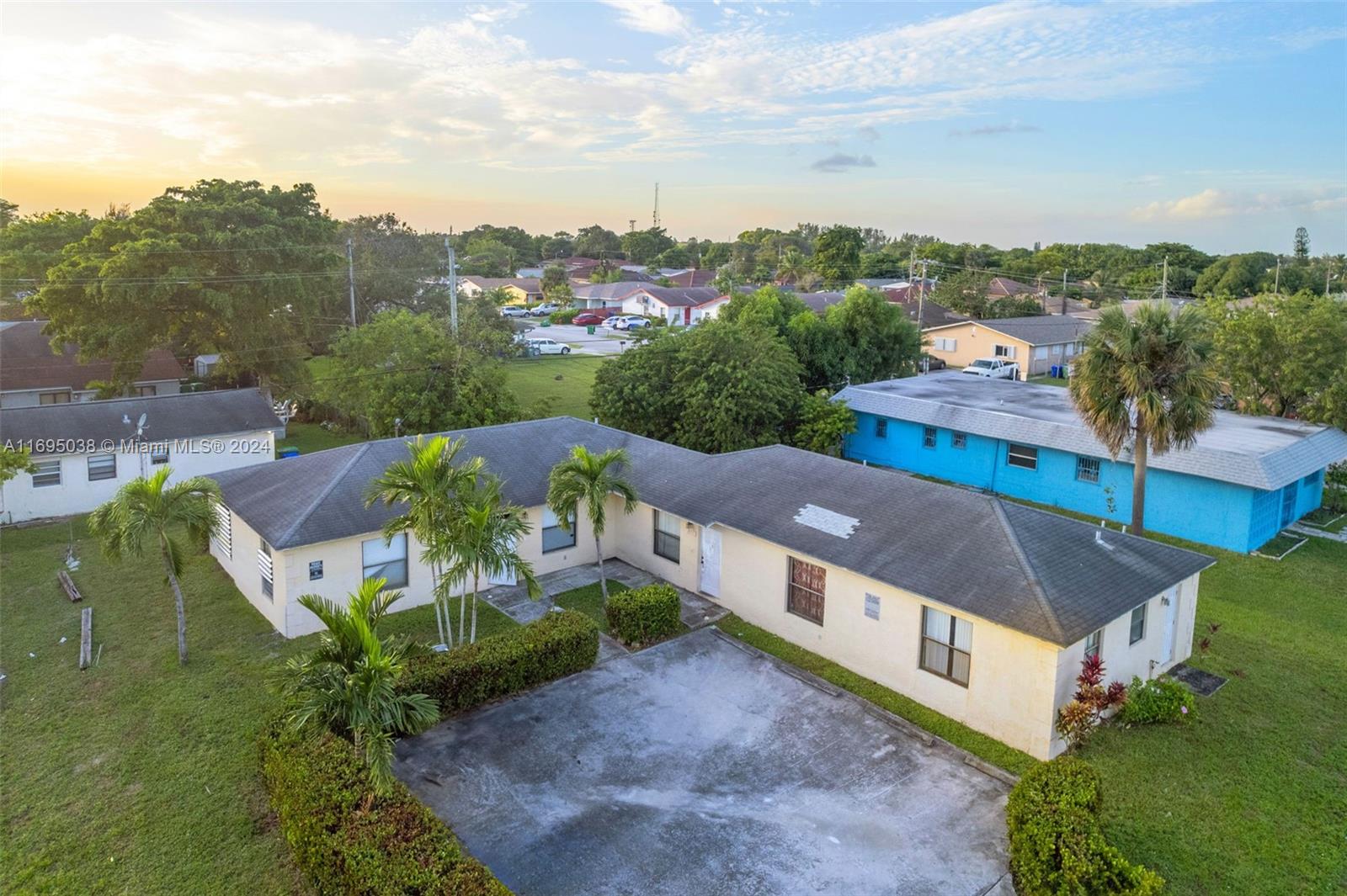 an aerial view of a house with a garden