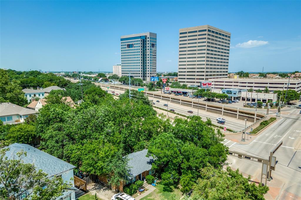 a view of a city with tall buildings