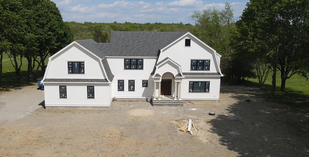 front view of house with a yard