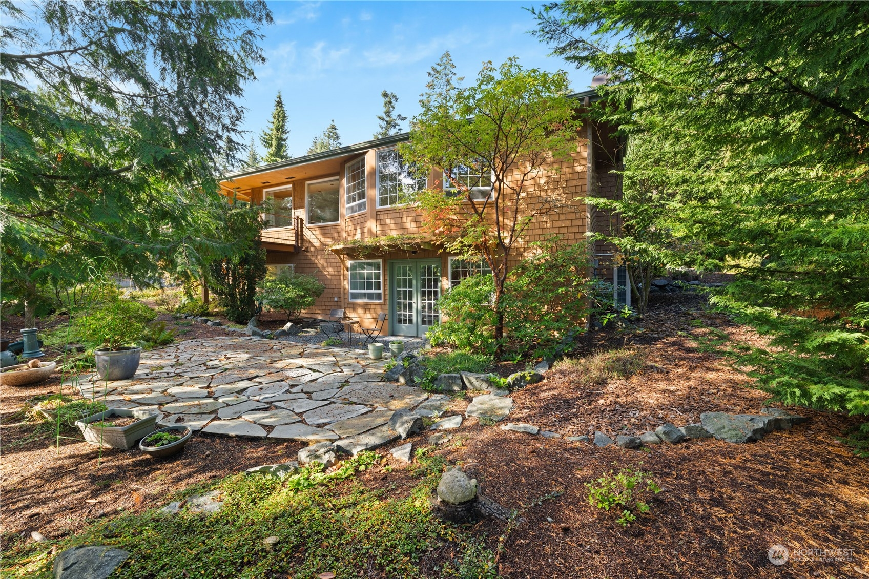 a view of a house with a tree