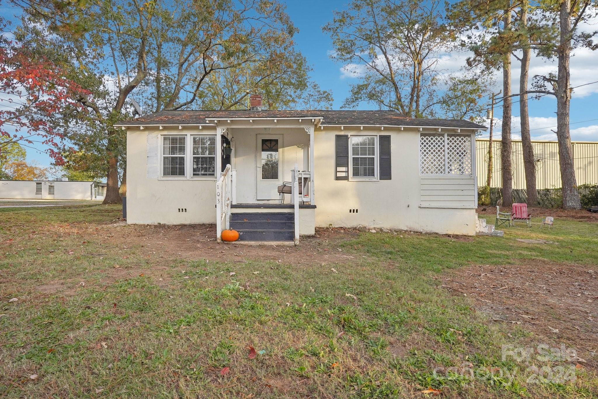 front view of a house with a yard