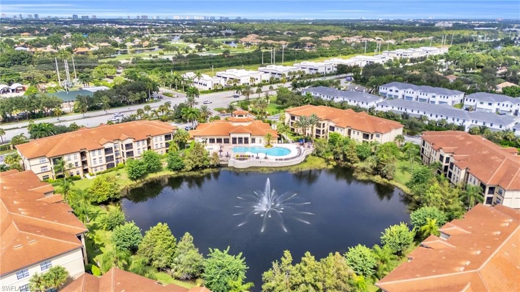 Aerial view featuring a water view