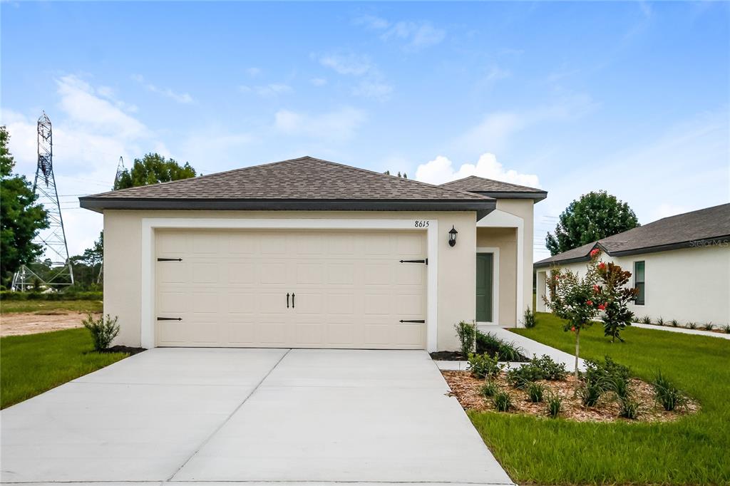 a front view of house with yard