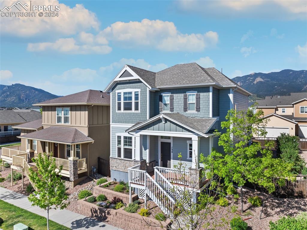 Craftsman inspired home featuring a mountain view