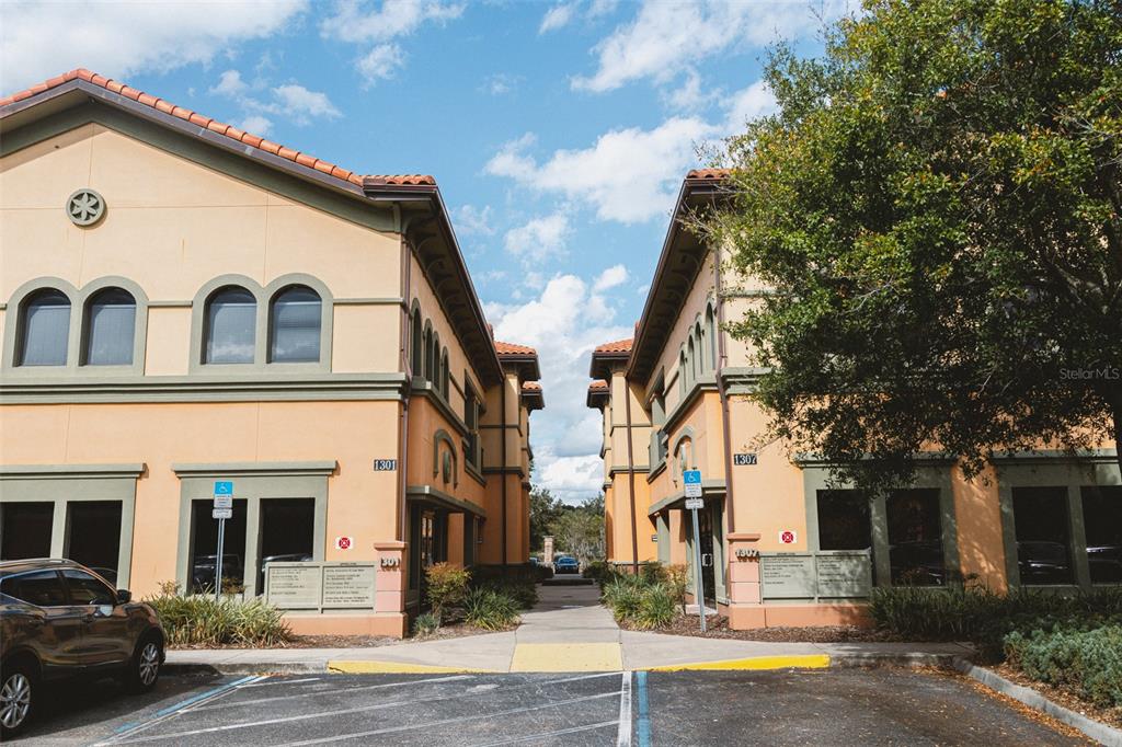 a view of a building with a street