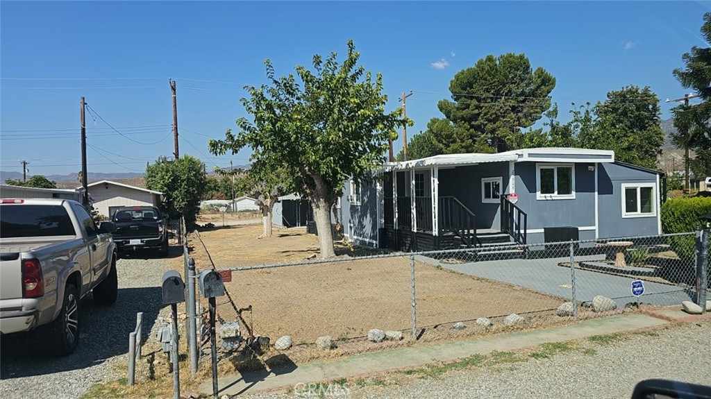 a view of a house with outdoor kitchen