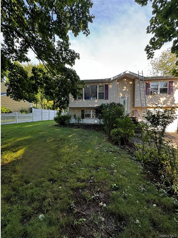 a view of a house with a big yard