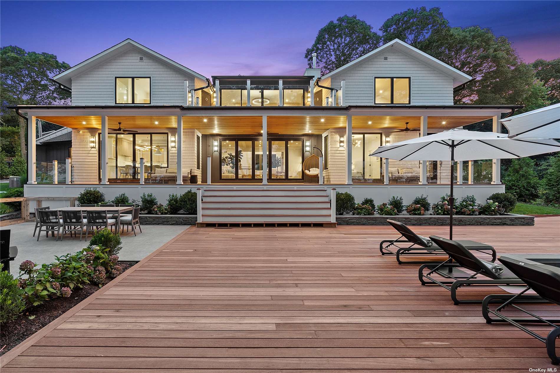 a swimming pool with outdoor seating