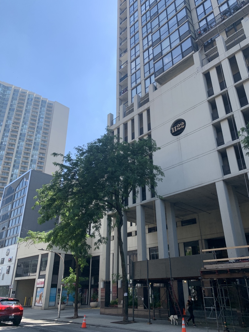 a view of a building with a street