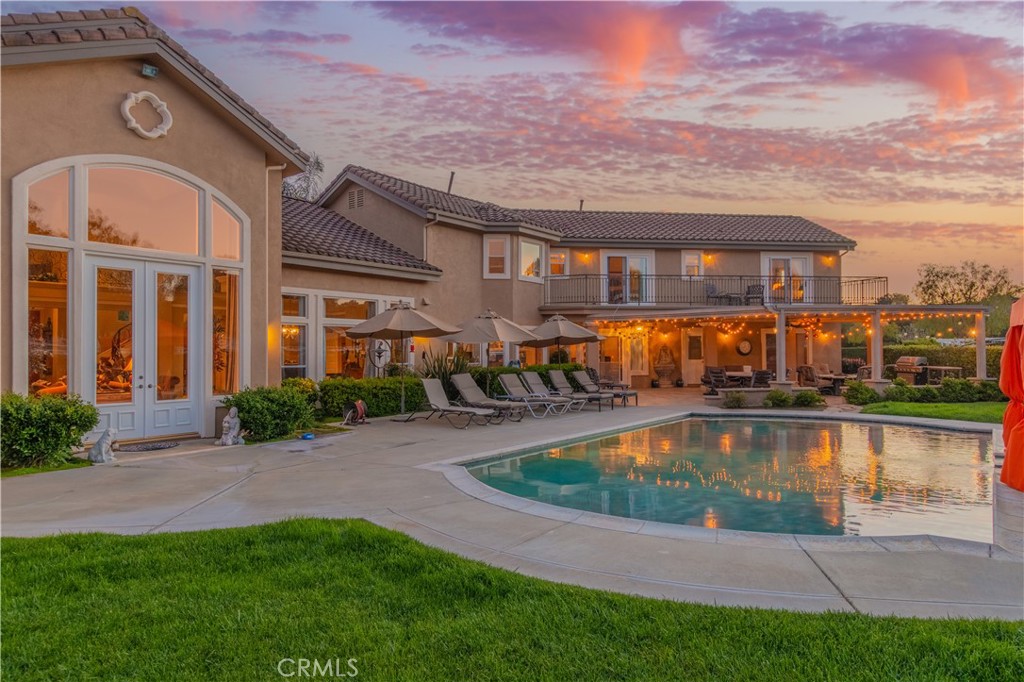 a view of a house with a swimming pool