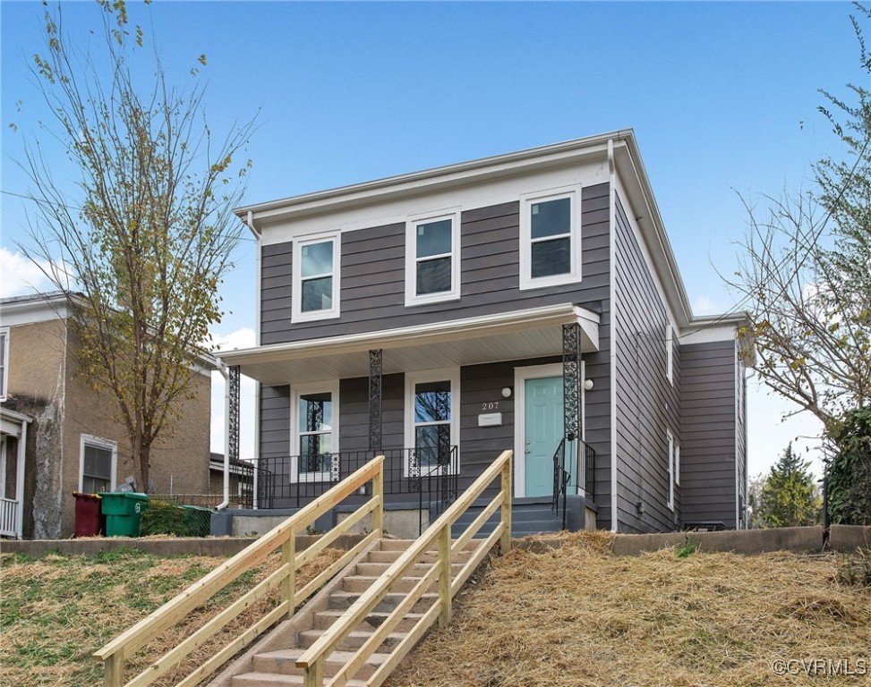 front view of a house with a yard