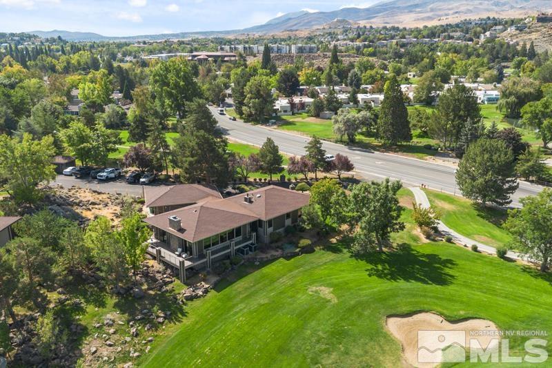 an aerial view of a house with a garden