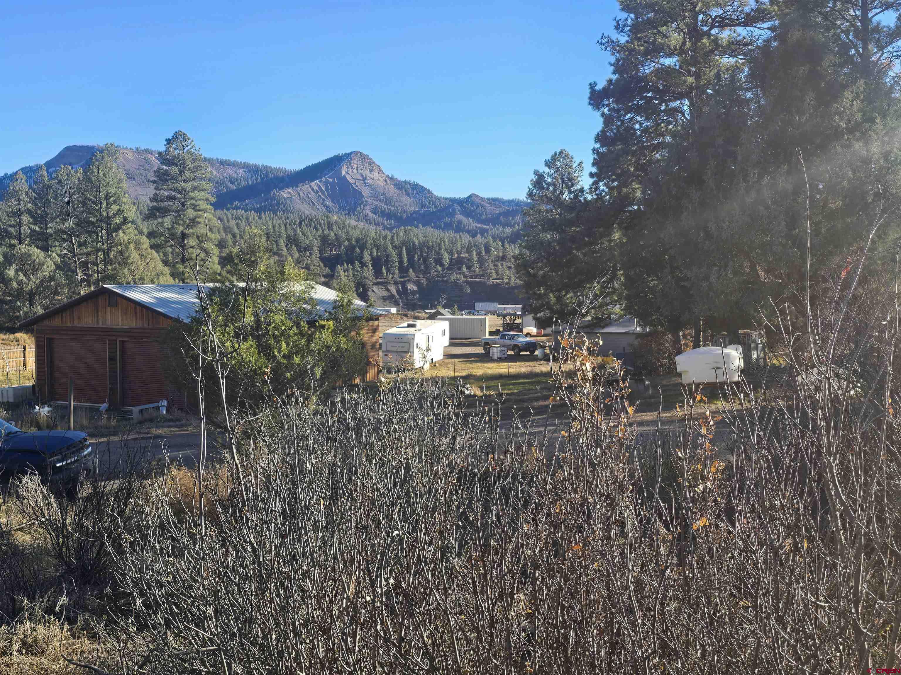 a view of multiple house with a yard