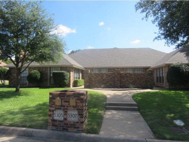 a front view of house with yard