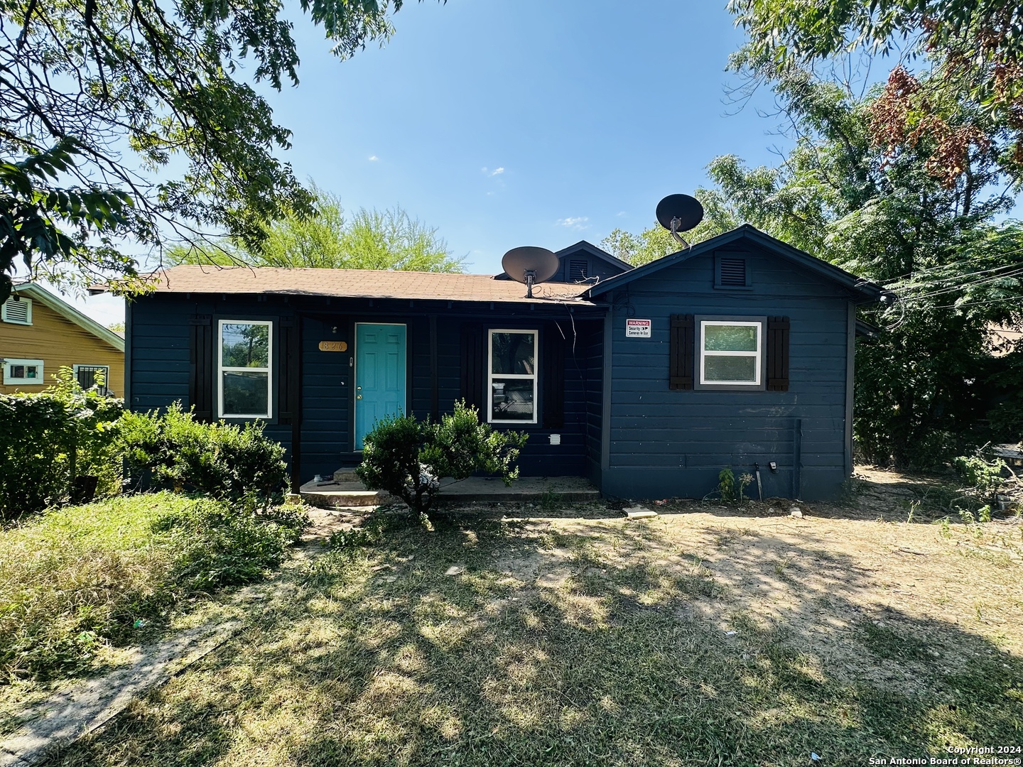 a front view of house with yard