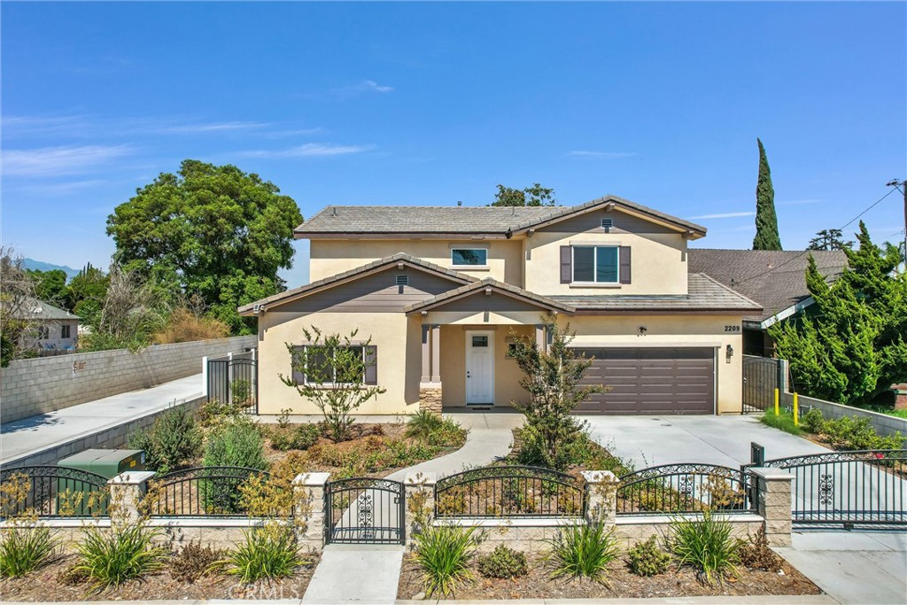 front view of a house with a small yard