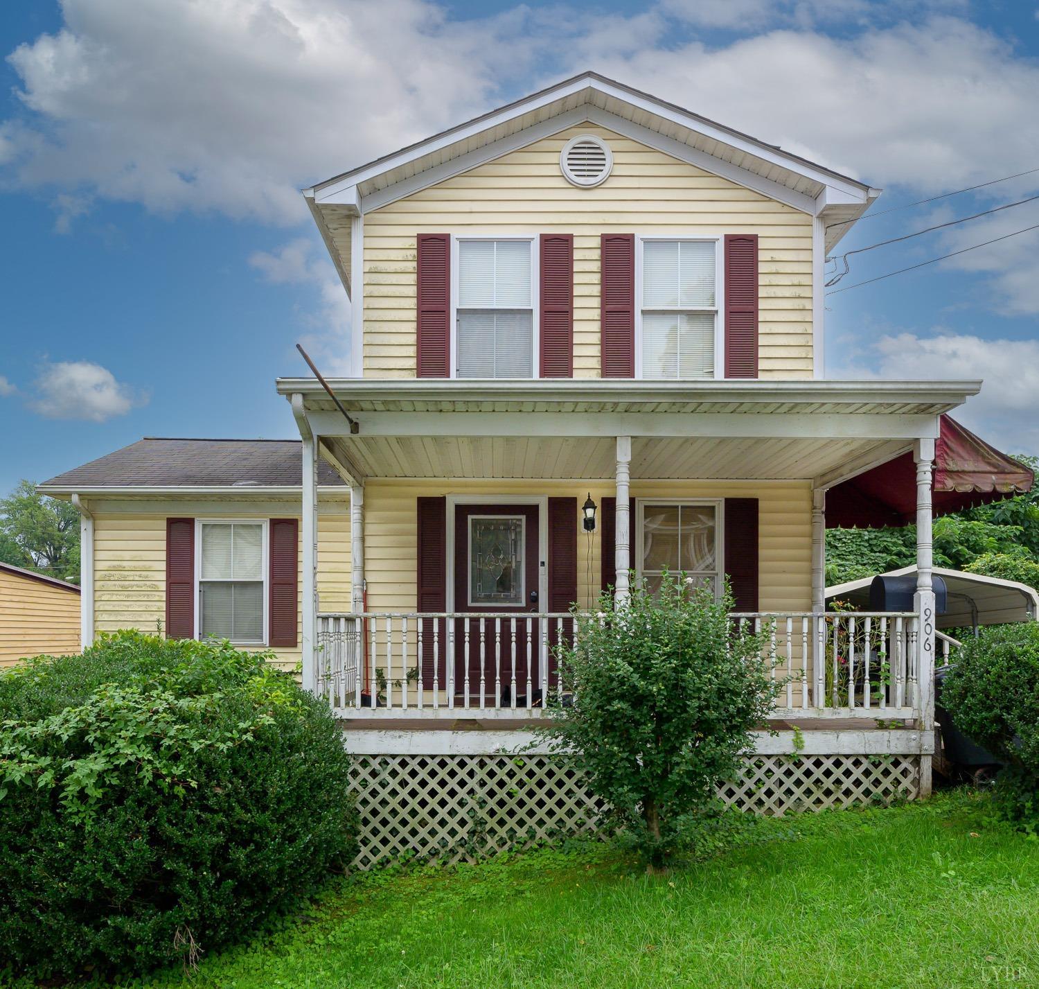 front view of a house with a yard