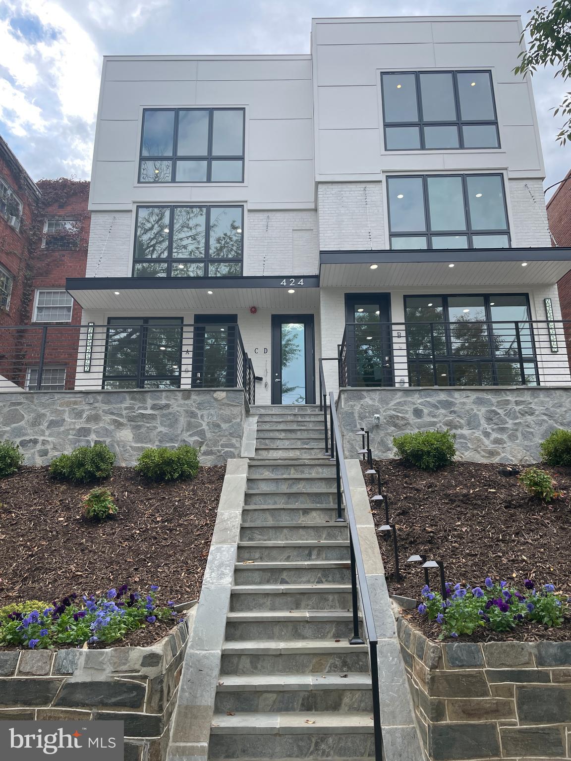 a front view of a building with glass windows