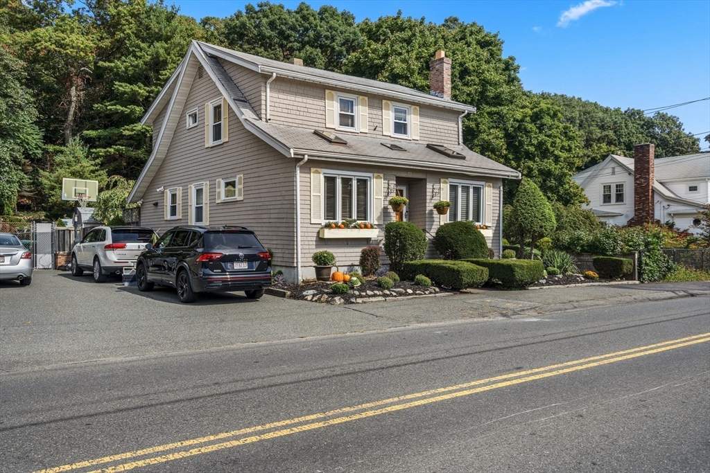 a car parked in front of a house