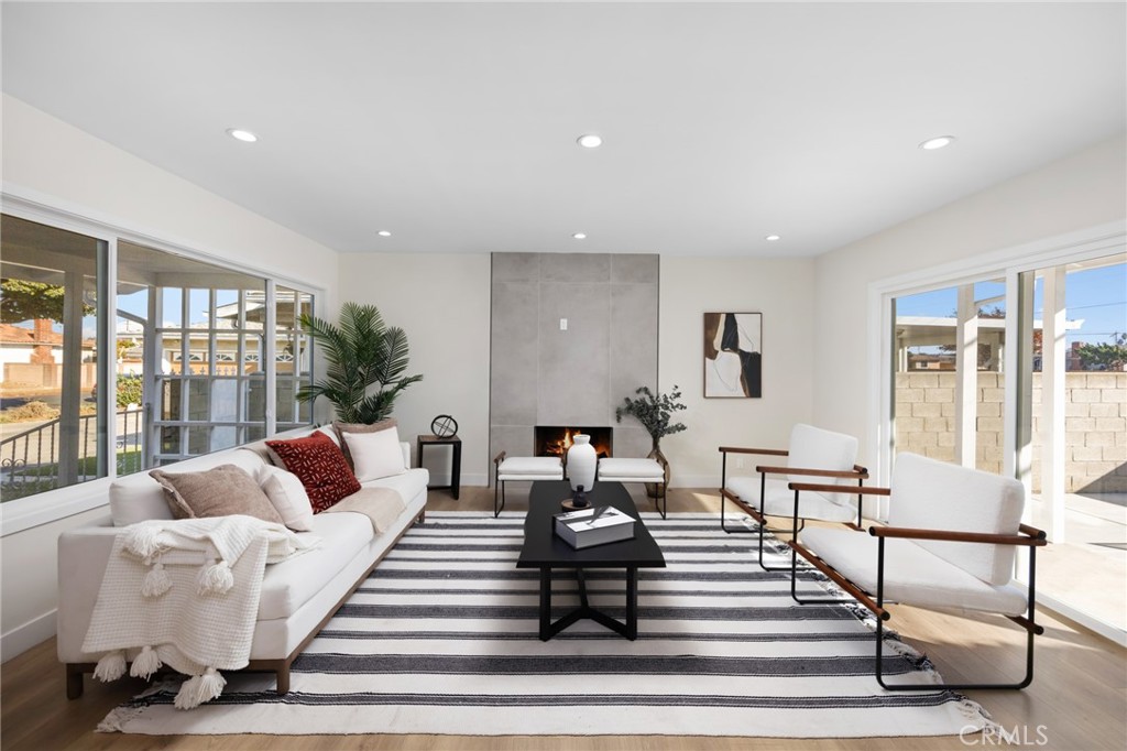 a living room with furniture and a table