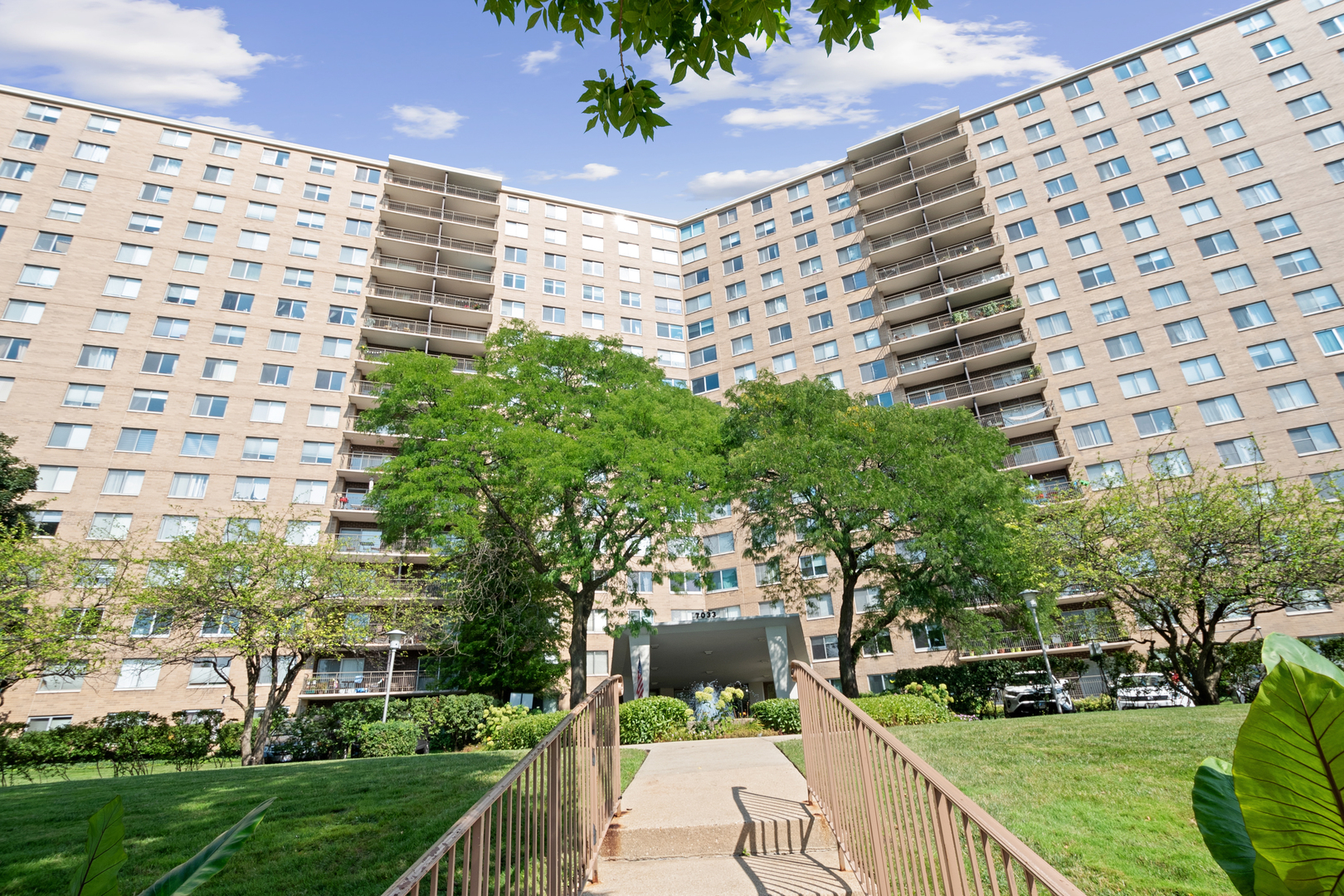 a view of building with yard