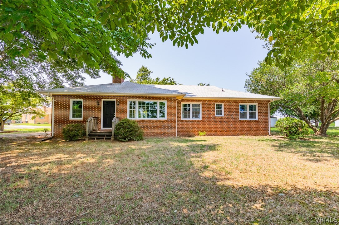 front view of a house with a yard