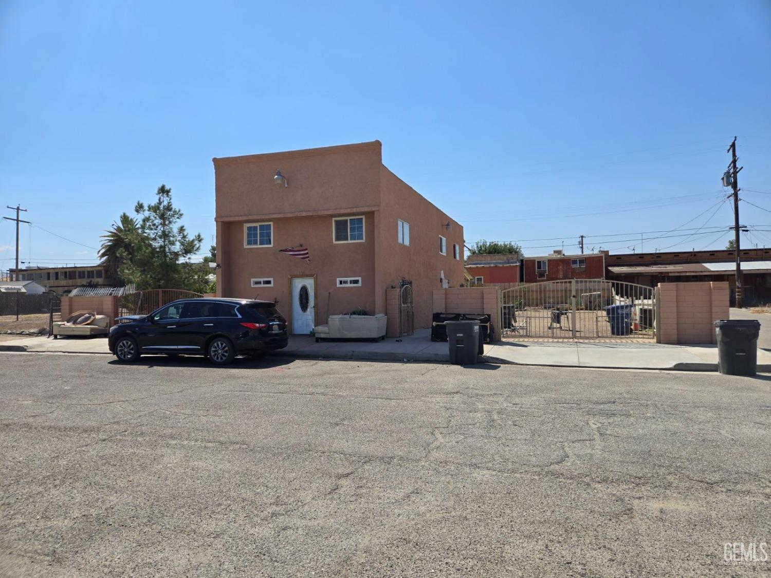 a view of a car parked in front of a house