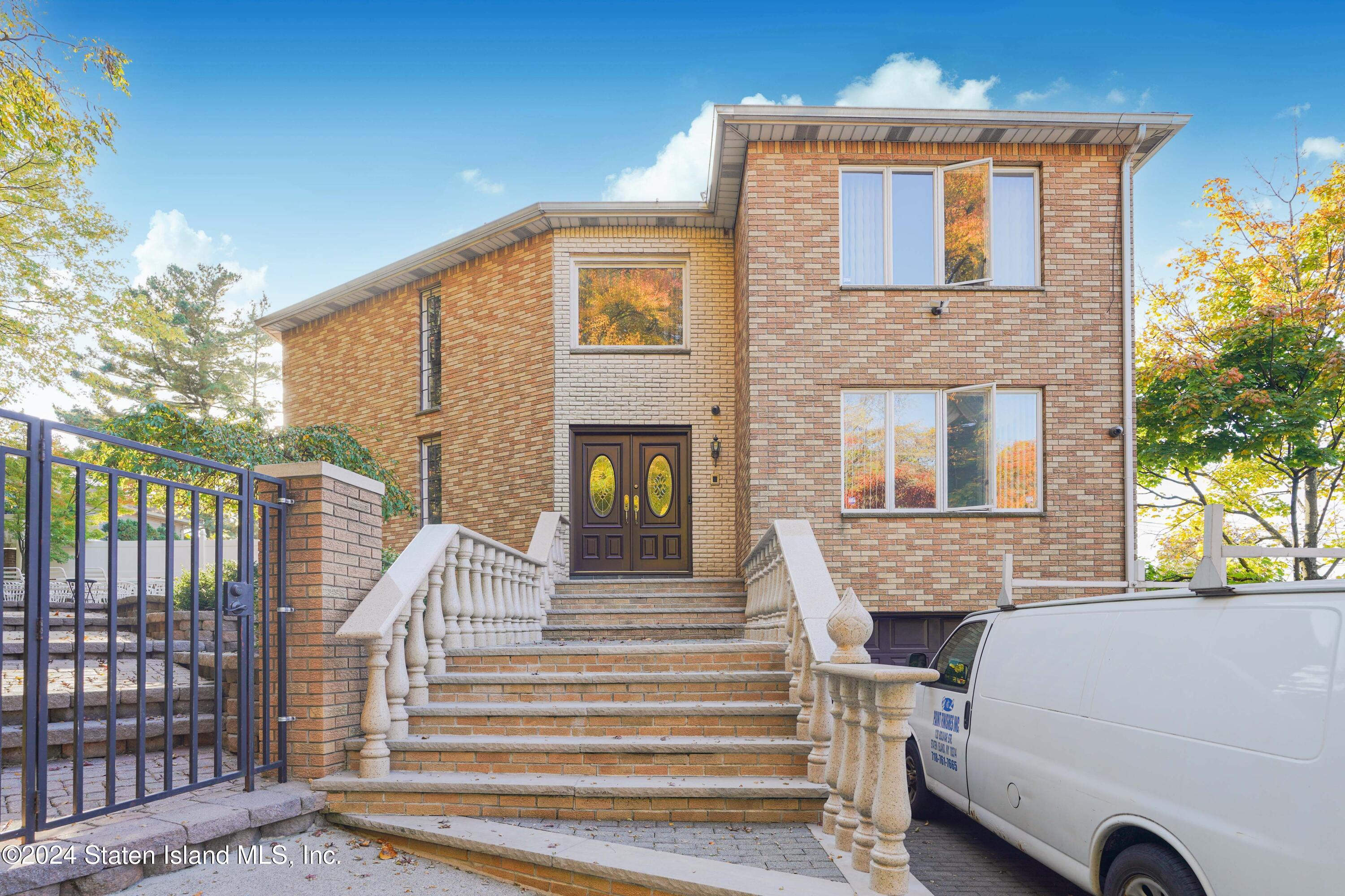 a front view of a house with a balcony