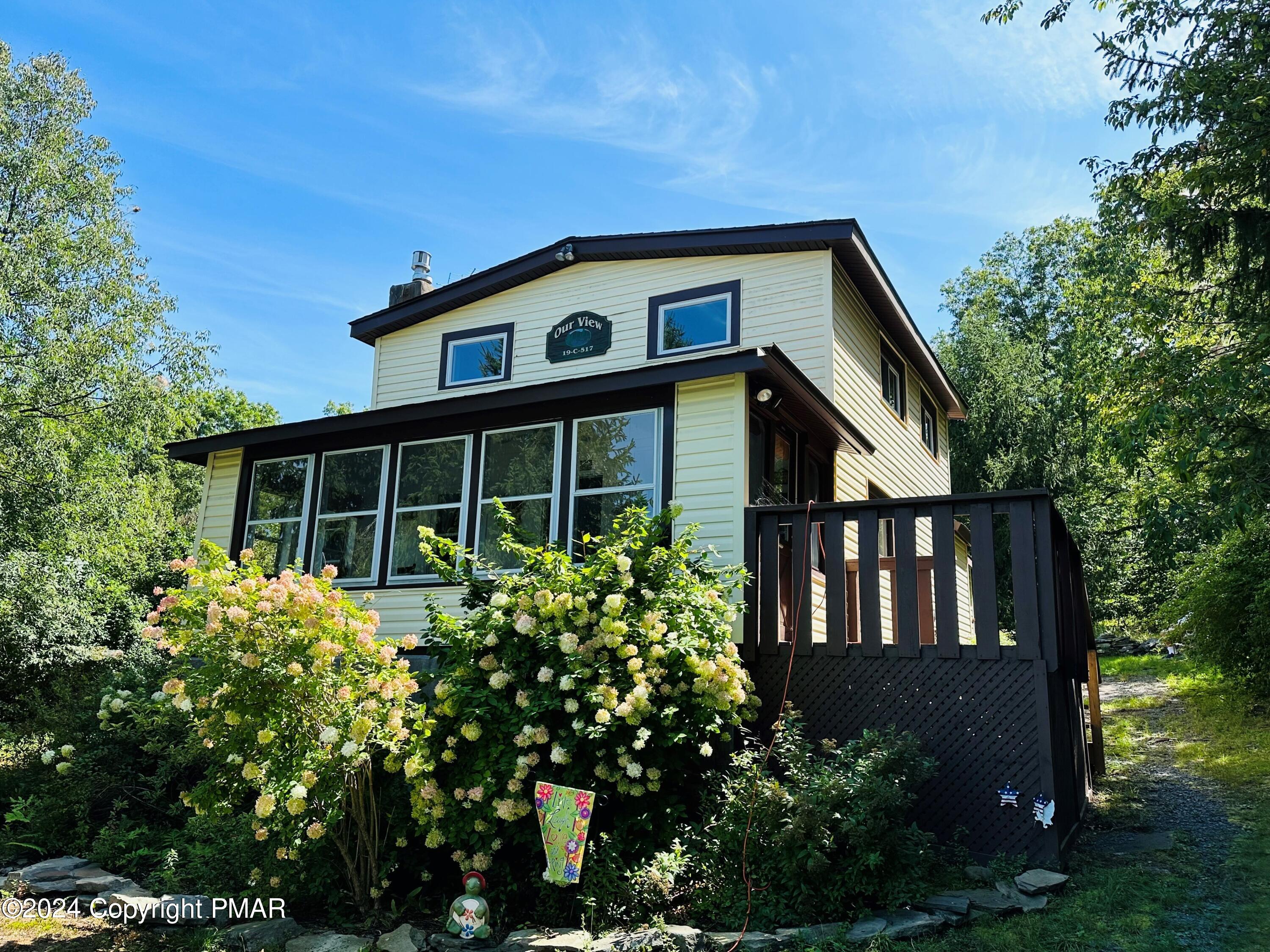 a house view with a garden space