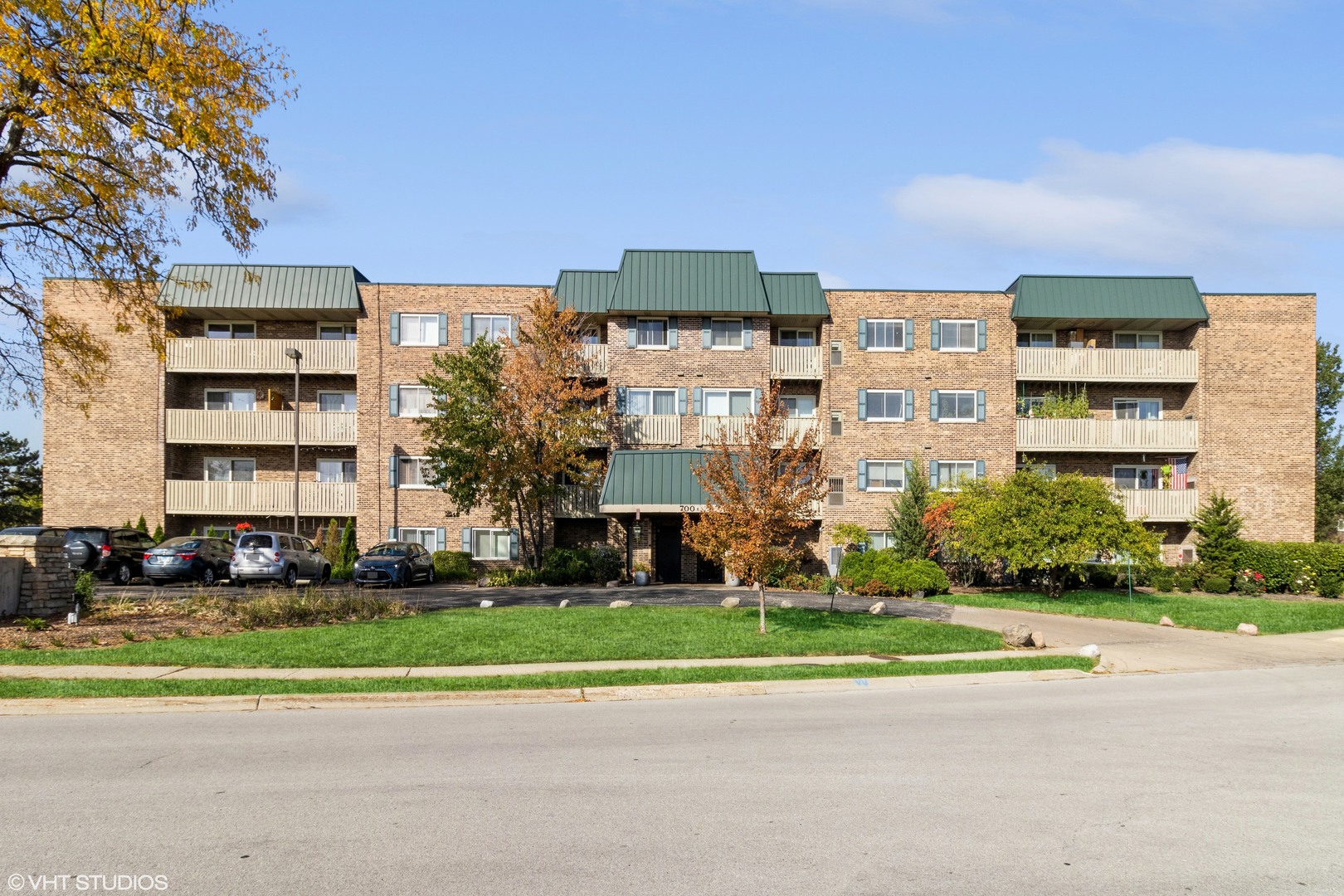 a front view of a building with street view