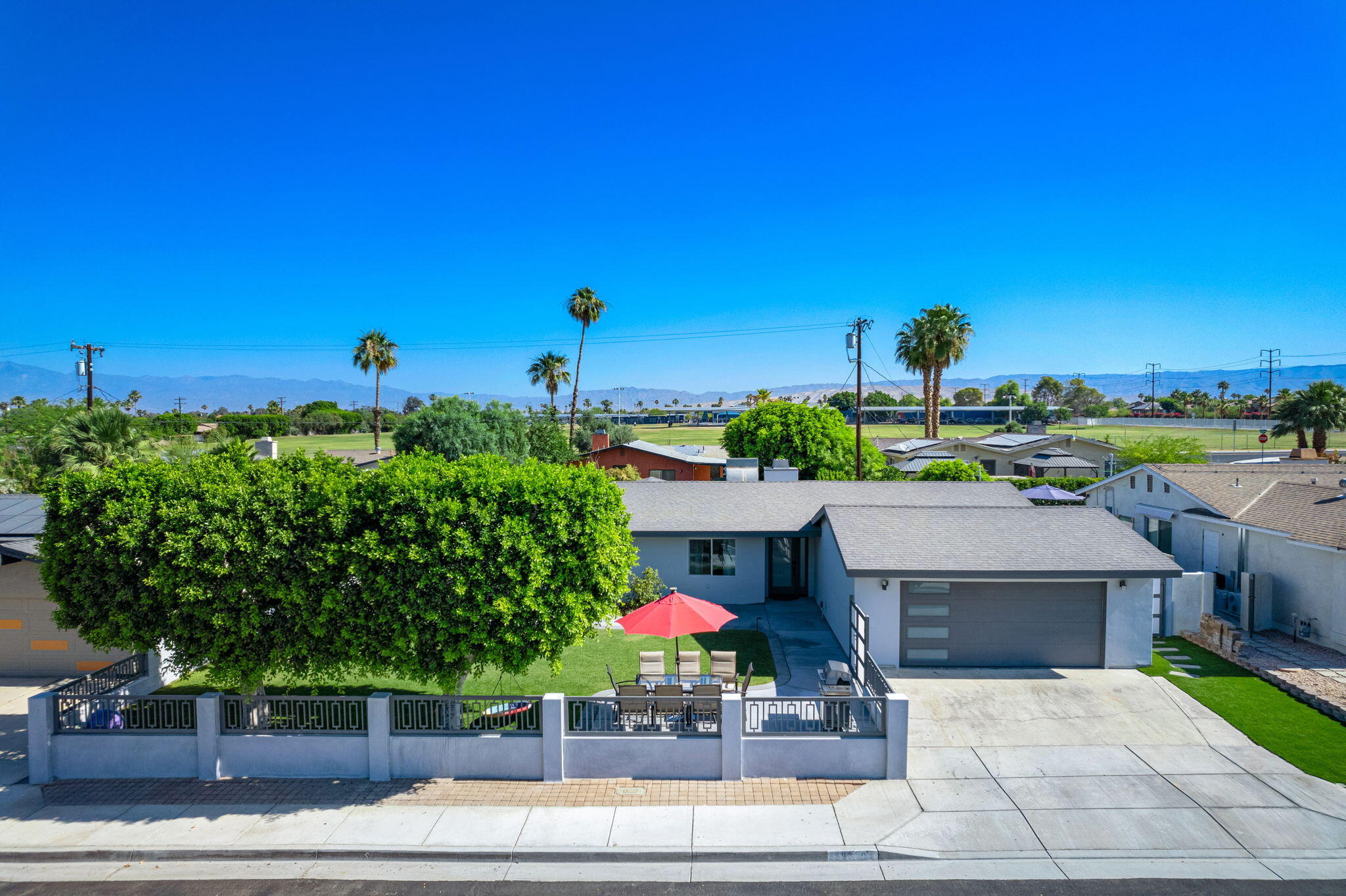 a view of house with outdoor space and seating space