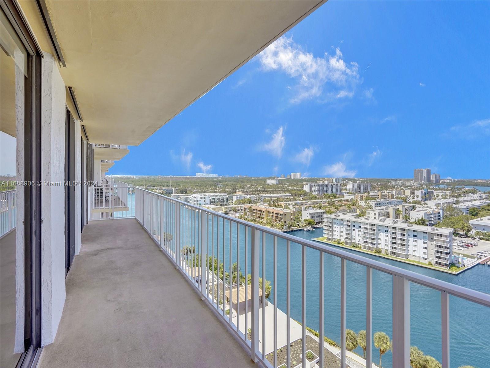 a view of a balcony with an ocean view