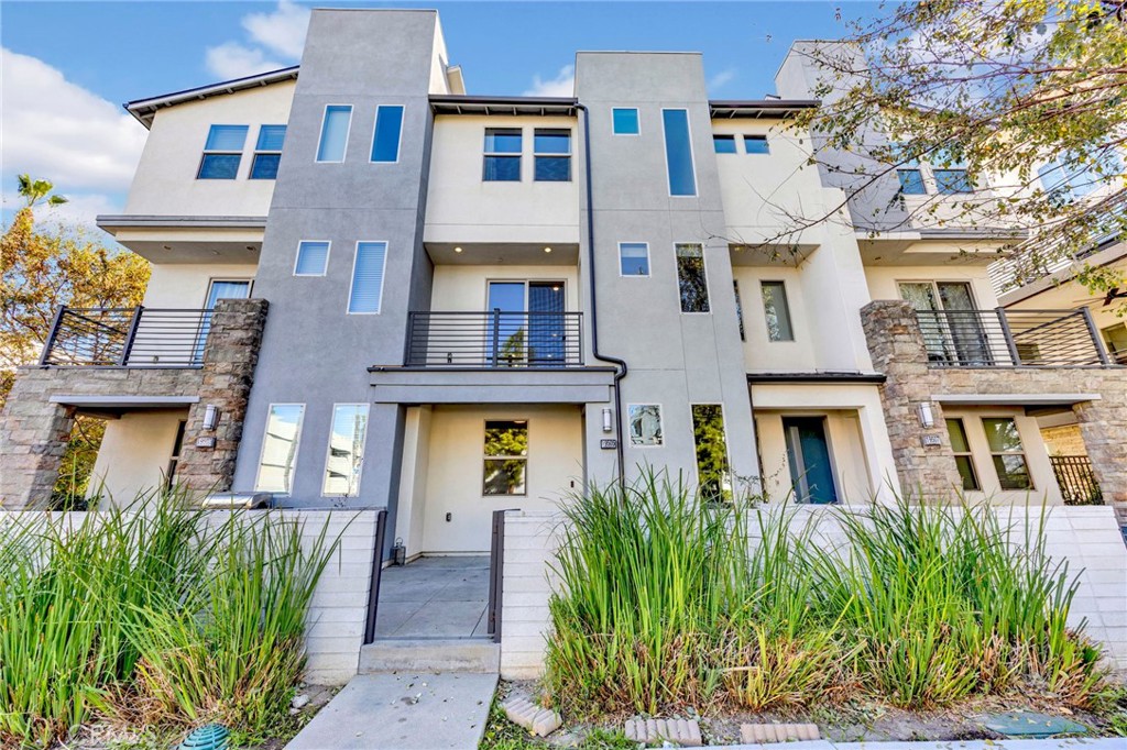 a front view of a multi story residential apartment building