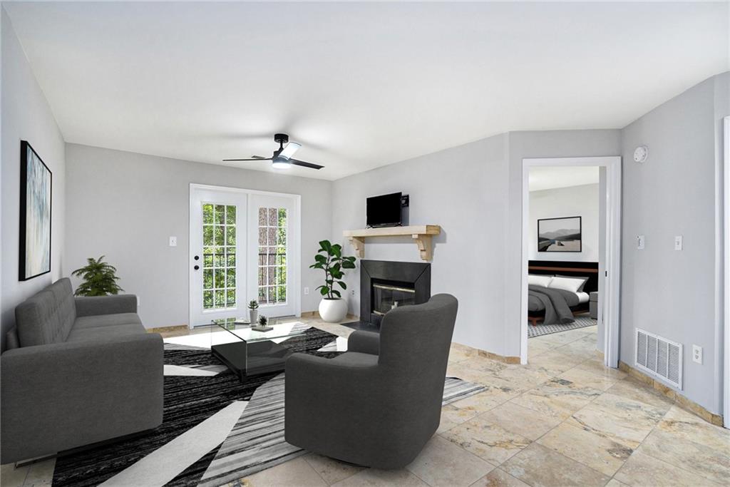 a living room with furniture and a fireplace