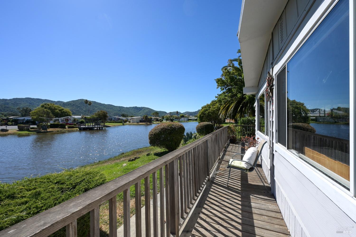 a view of a balcony with lake view