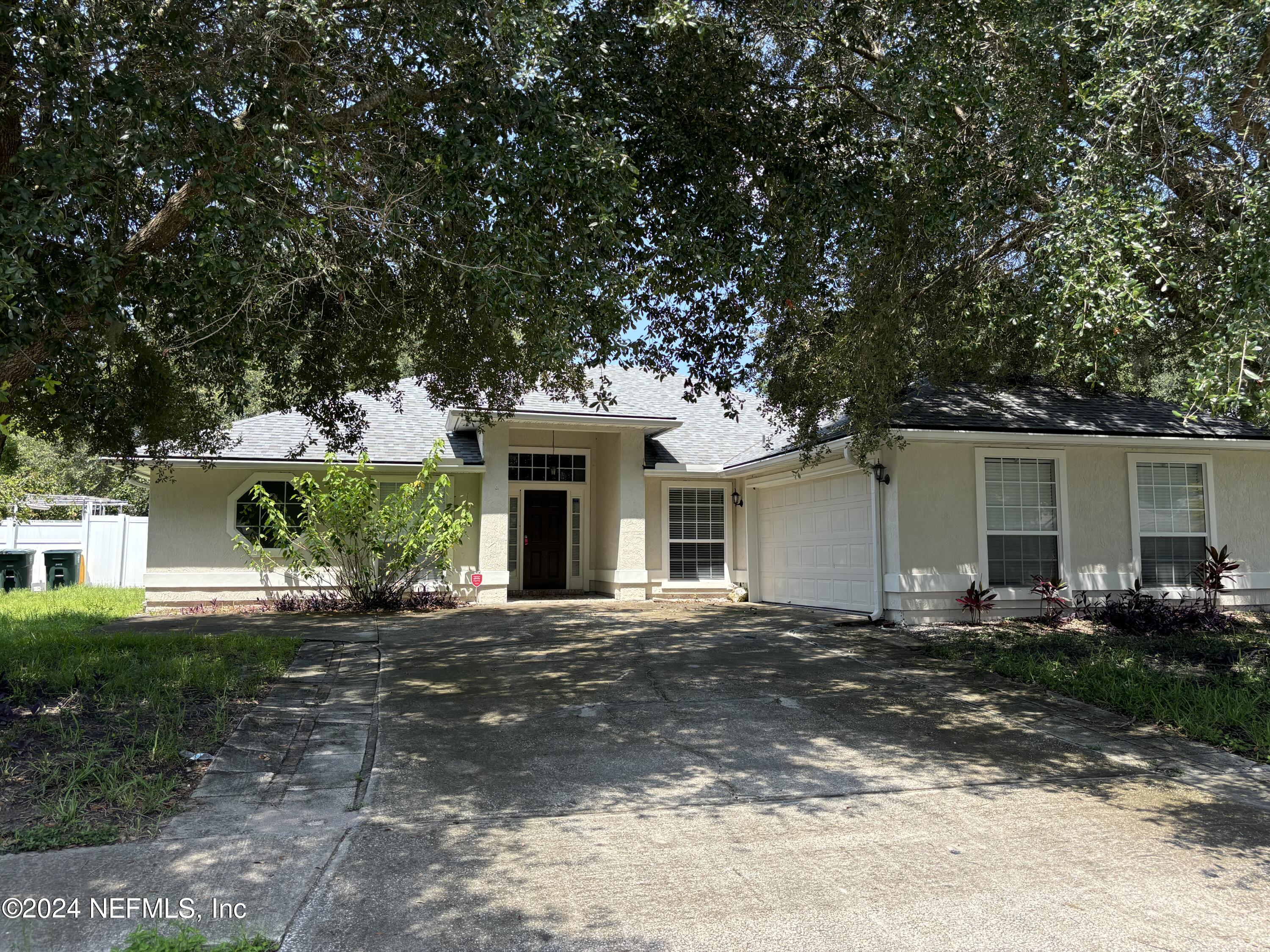 front view of a house with a patio