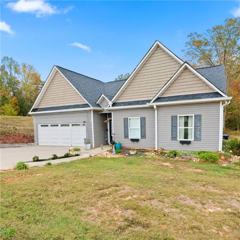 a big house with yard in front of it